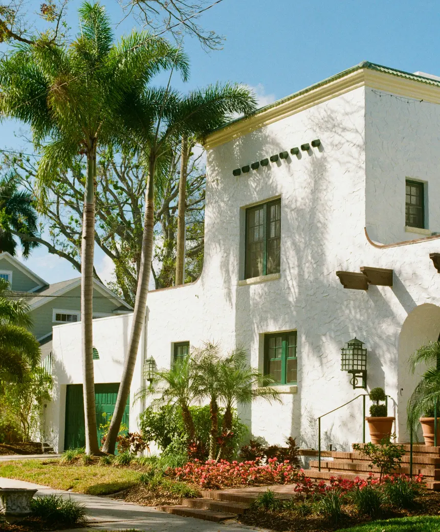 Florida waterfront houses with docks and palms